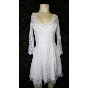 White lace low cut bell sleeve dress